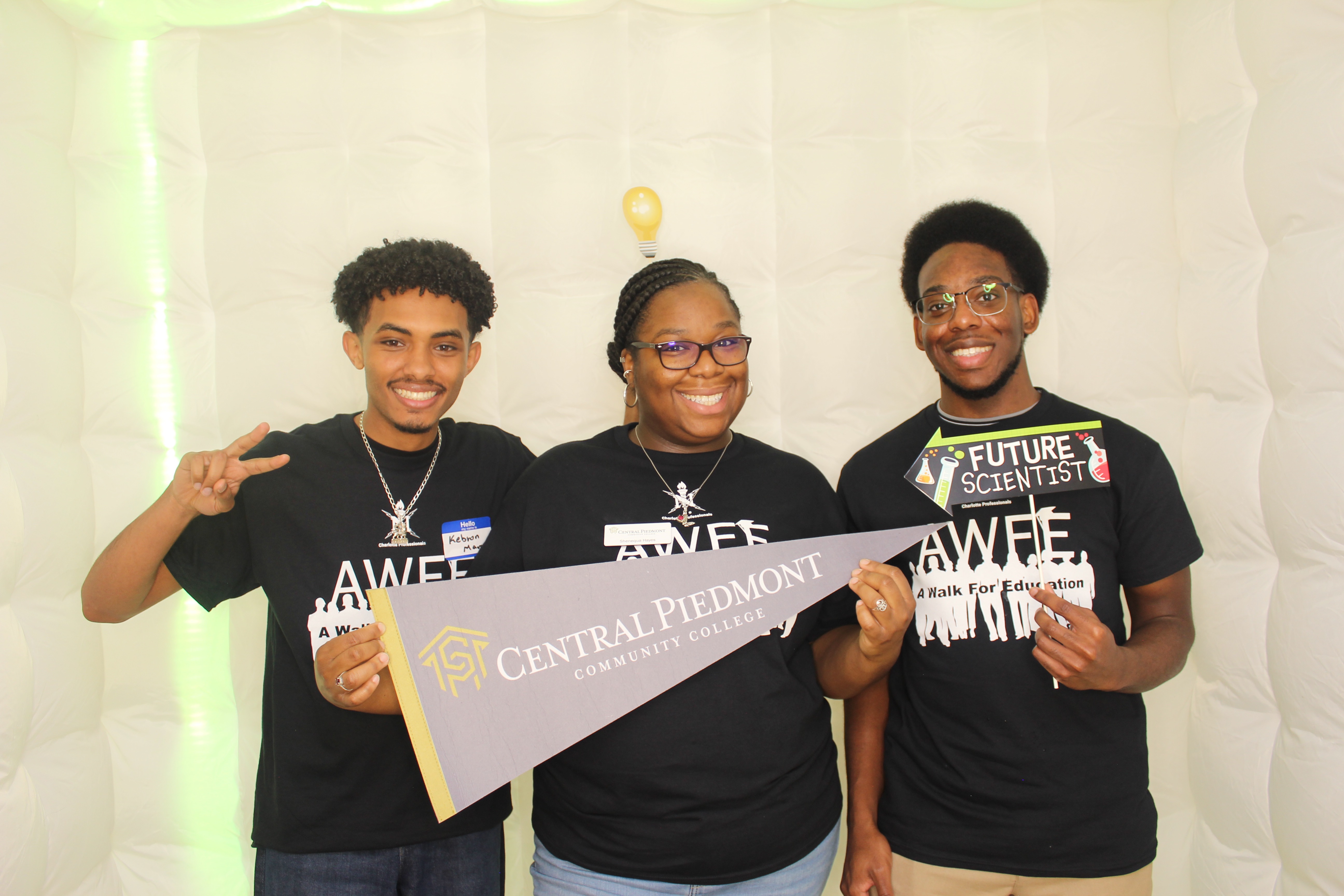 Event attendees with Central Piedmont banner