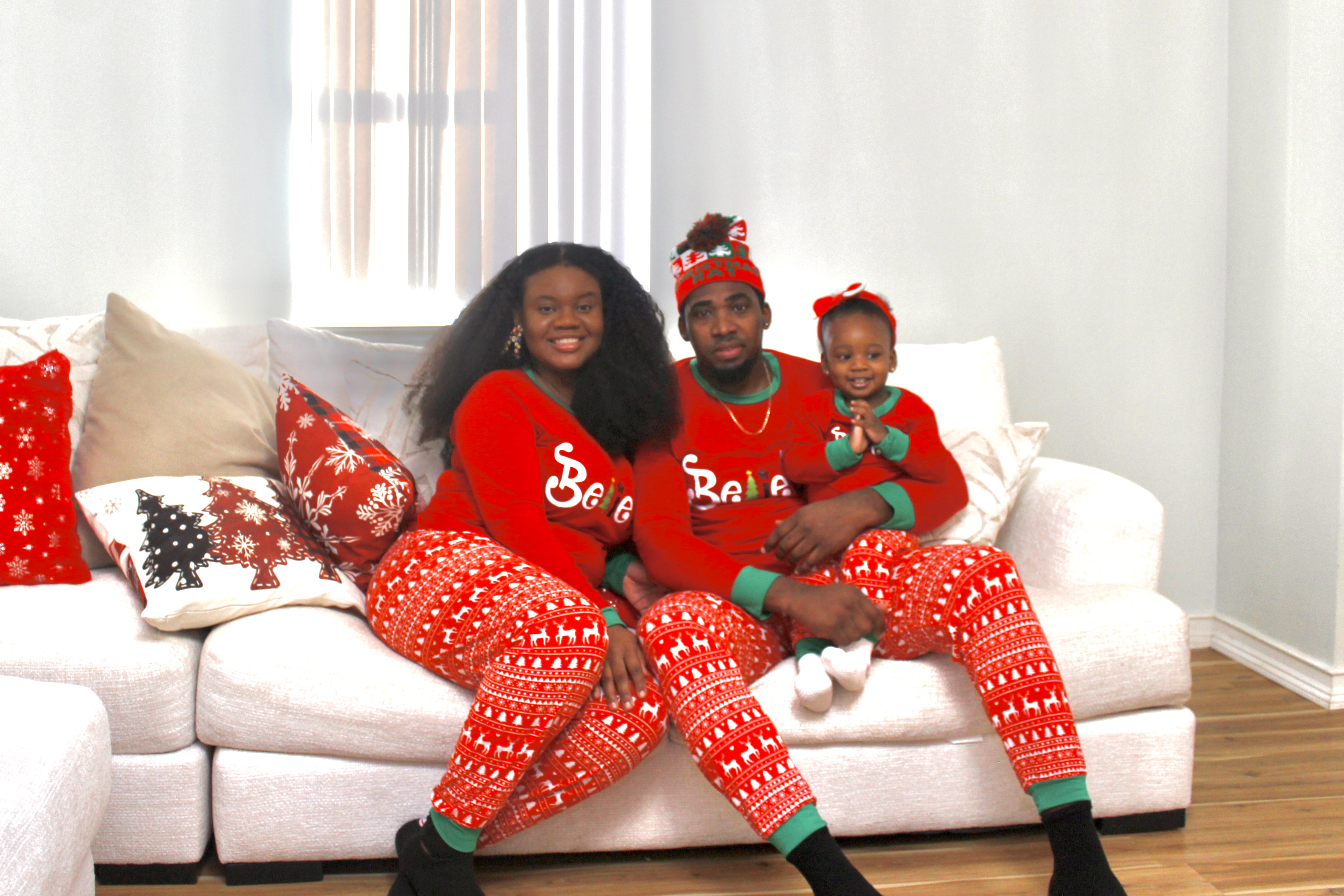 Family in matching Christmas pajamas